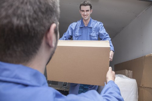 Removal team planning a home move in a London residential street