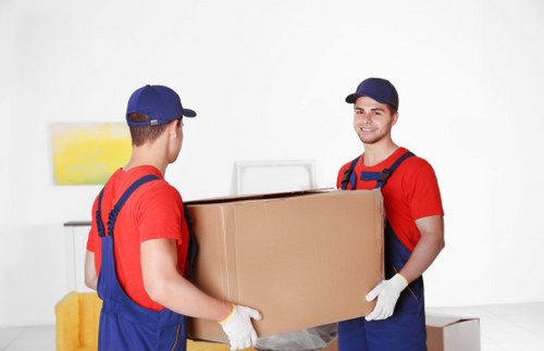 House removalists loading furniture for a London home move