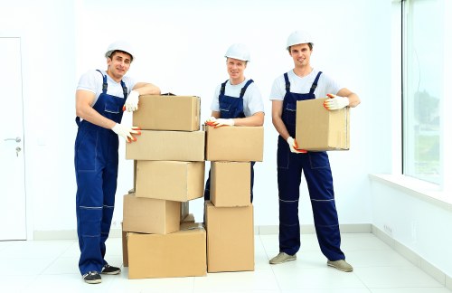 Packed office equipment and labelled boxes ready for transport