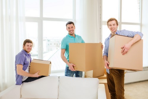 Packed boxes and furniture ready for transport during a flat removal in London