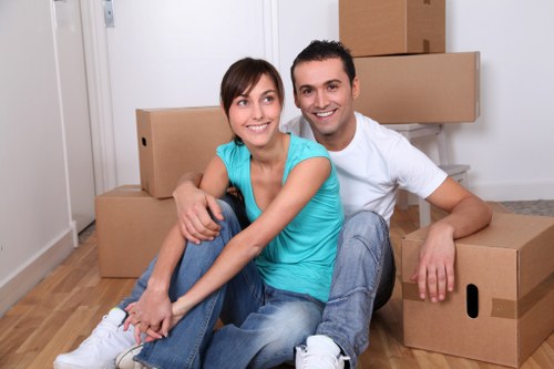 Commercial movers helping a London business relocate office furniture