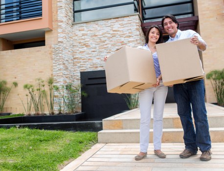 Loading furniture into a truck for a London relocation